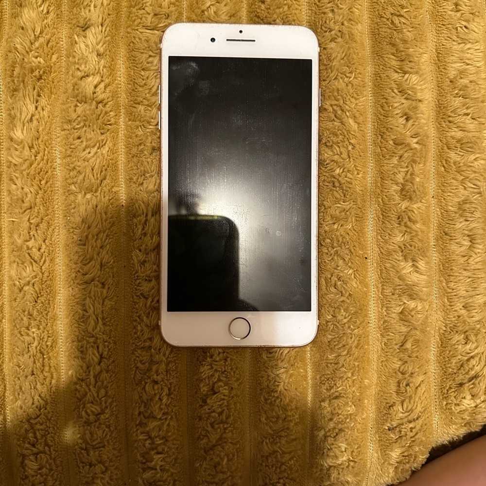 Apple Smartphone with White Edges and Black Screen